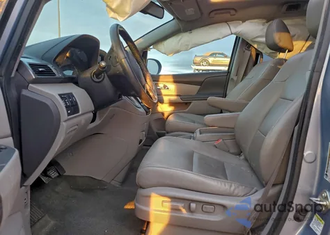 2014 Honda Odyssey Exl z USA, uszkodzony, nr VIN 5FNRL5H63EB111204